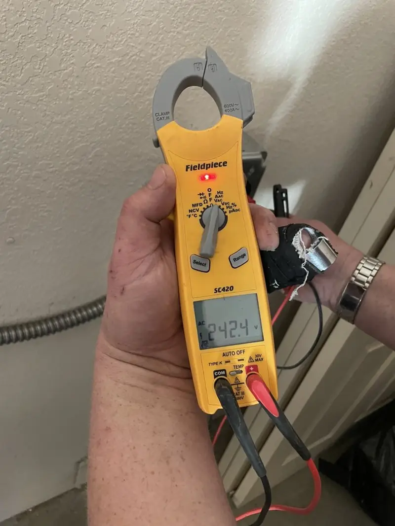 Voltage testing with clamp meter during Electrical Installation Services in Indian Rocks Beach